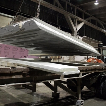 Cured panels being loaded onto trucks at Metromont