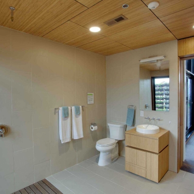 The bathroom serves as a corridor between the public and private spaces...