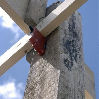 Site-harvested locust post with commercial dimensional  lumber truss